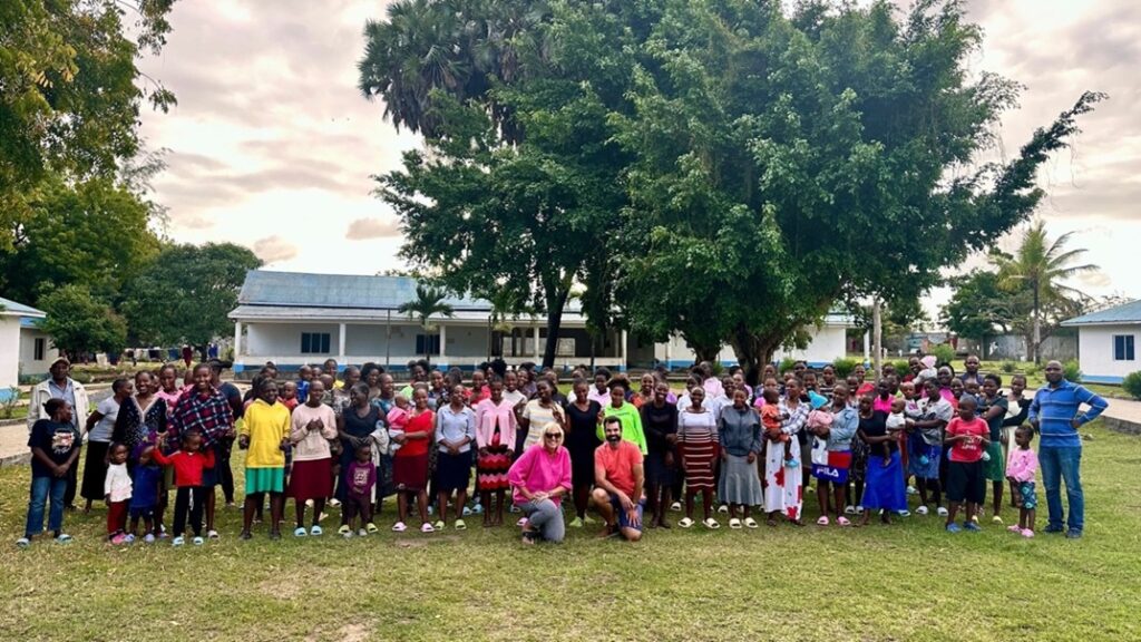 A group of people pose for a photo in Kenya